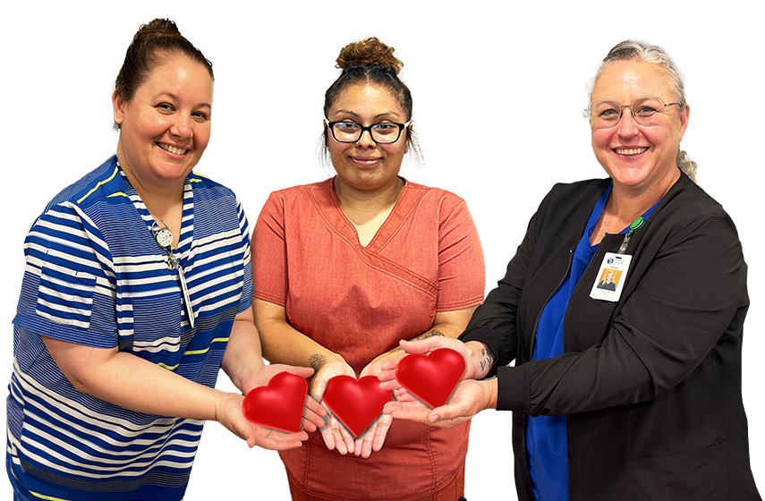 CCMC nurses holding paper hearts